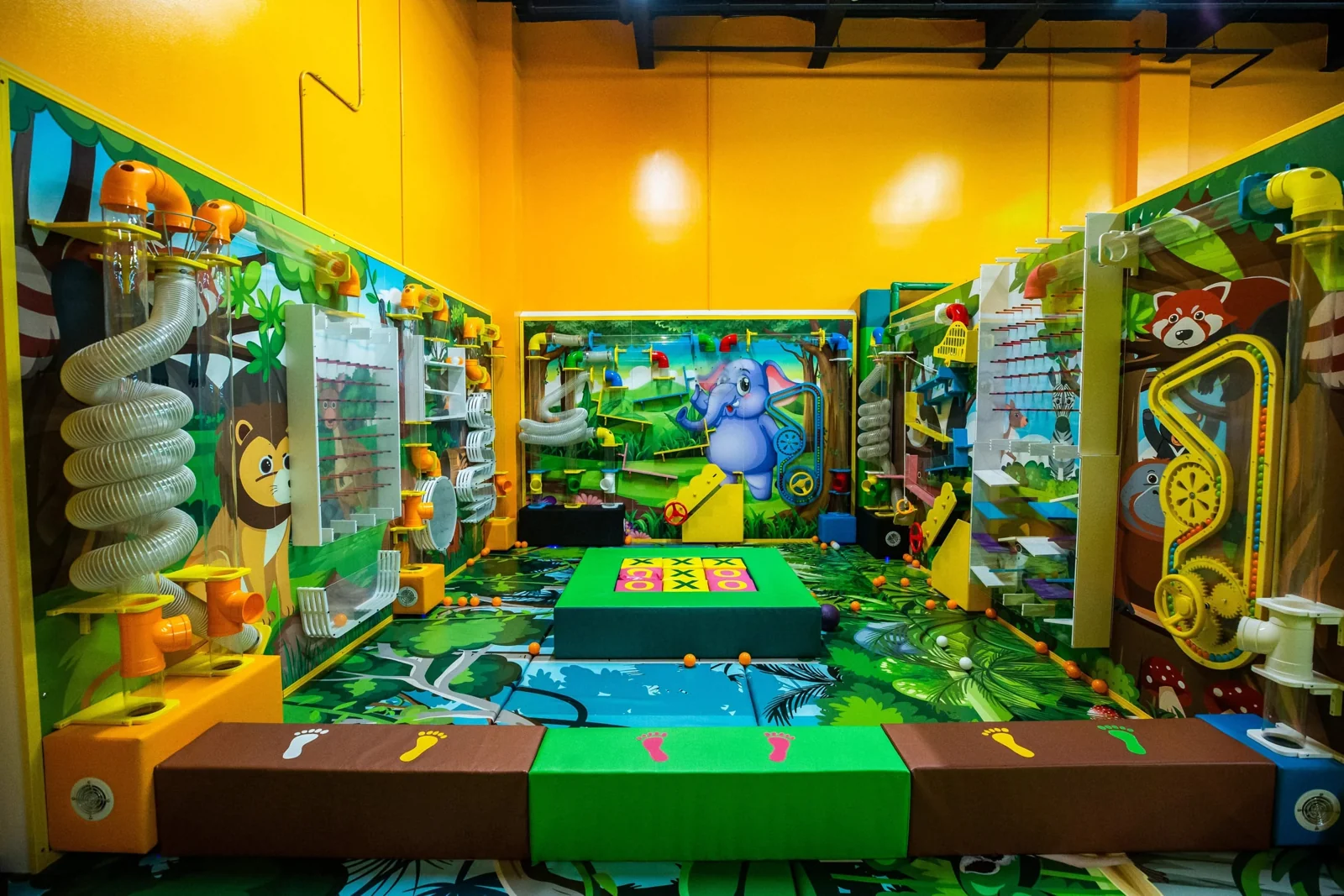 The smaller padded Kids Cove with its bright green floor and play features